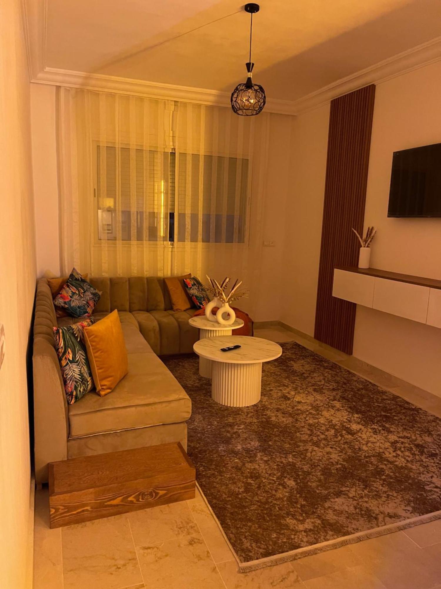 טנג'יר Elegant Appartement Avec Un Acces Piscine Jardin Parking Sous-Sol Et Wifi Haut Debit Fibre Optique מראה חיצוני תמונה